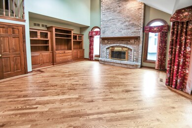 Family Room w/Frpl and built in Media Center