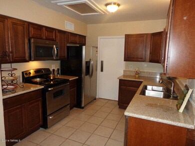 KITCHEN WITH DOOR CLOSED TO DINING