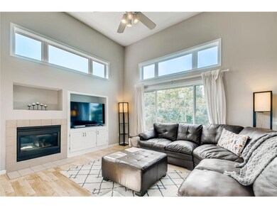 Main level living room. Built in fireplace and bui