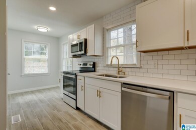 Brand new quartz counters, new cabinets with gold 