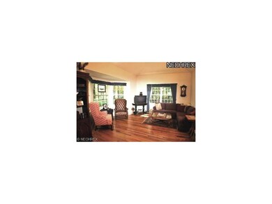 Vaulted Great Room has beautiful wood floors and v