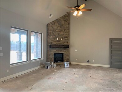 Living room offers beamed cathedral ceiling, stunn