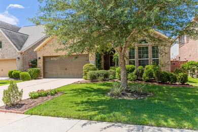 This home features a nicely landscaped front yard.