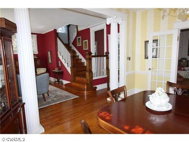 Living Room - Glass French Doors lead into the Family Room.