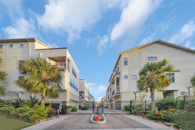 Gated community with beautiful landscaping and ben