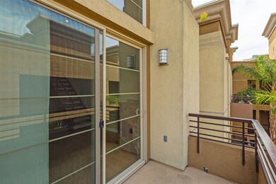 Sliding doors lead to the private balcony!