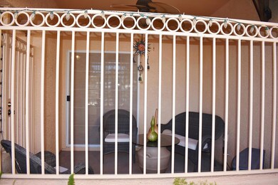 Fenced front courtyard