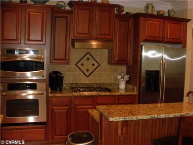 Kitchen - Stainless steel appliances convey, grani