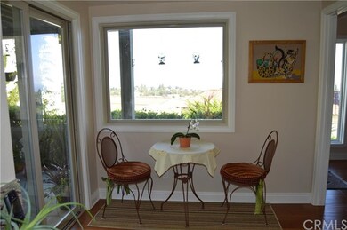 breakfast nook with sliding doors to the front pat