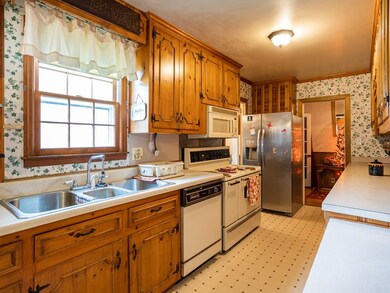 Kitchen  w/ Double Oven and Wood Cabinets