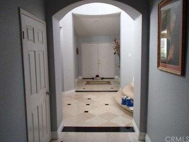 ENTRANCE DOOR WITH CHANDELIER ROOM 