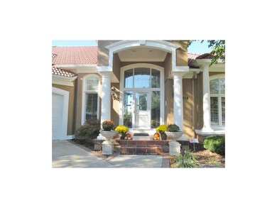 BEAUTIFUL FRONT ENTRY WITH WHITE COLUMNS