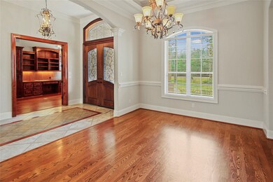 View of Formal Dining Room toward Front Door and Office/Study