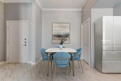 Virtually staged dining area and part of kitchen