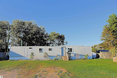 6064 U S 31, Grawn, MI 49637 - photo 2