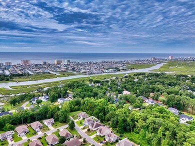 View of property location with nearby suburban area