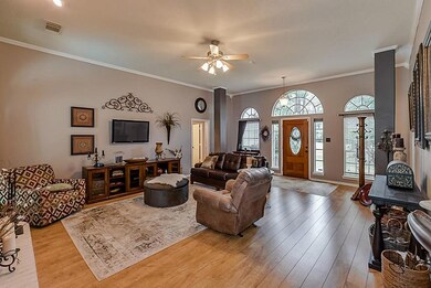 Spacious living room with fresh paint and tall ceilings.