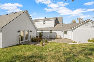 enter home from back patio into primary suite or laundry room