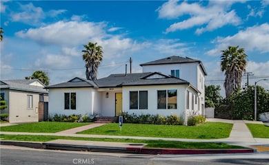 Front with view down the side to the driveway and Garage