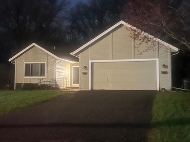Charming curb appeal with flower boxes under the lighting. Outdoor furniture left by long-term prior owner can remain with the property if buyer prefers. This house has been loved for many years. Wonderful neighbors out front (but privacy in back)!