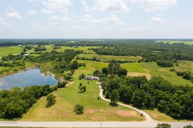 Aerial view of sparsely populated area with a large body of water