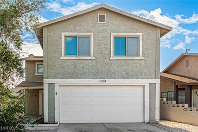 View of front of property featuring stucco siding,