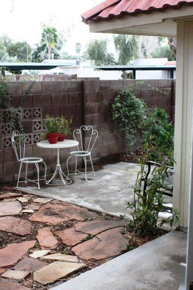Attractive patio and small yard to enjoy