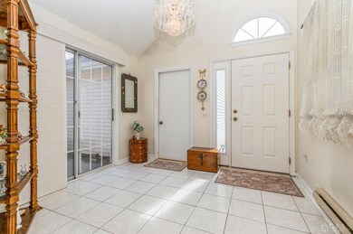 Large Entryway with Ceramic Tile - Sliders to Private Enclosed Patio and Door to Oversized 2-Car Garage