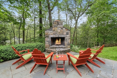 Evenings by the outdoor fireplace are a favorite retreat.