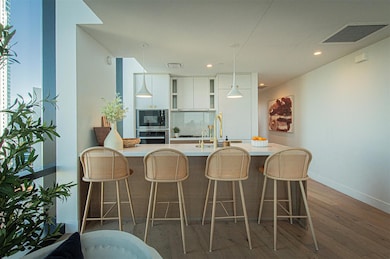 Kitchen with open shelves, stainless steel oven, 