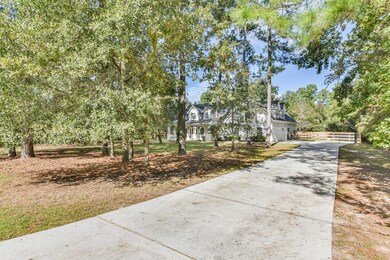 Front yard is shaded by mature trees