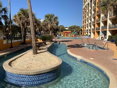 View of property's community featuring a playgroun