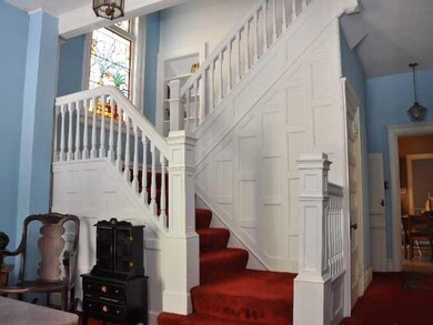 Entry/Foyer. Original 1900s wooden staircase, with