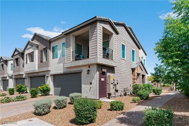 Townhome / multi-family property featuring a garag