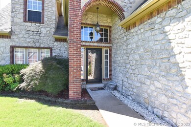 Inviting arched entry.  Home faces north on quiet