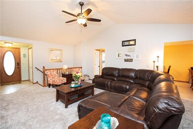 Great Room with vaulted ceilings...newer carpet