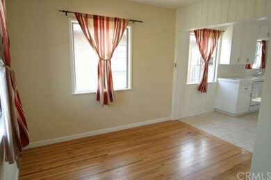 Large dining area with oak floors
