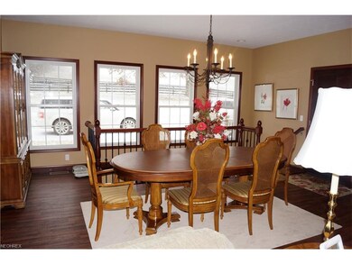 DINING AREA WITH LOTS OF WINDOWS AND PRETTY VIEWS!