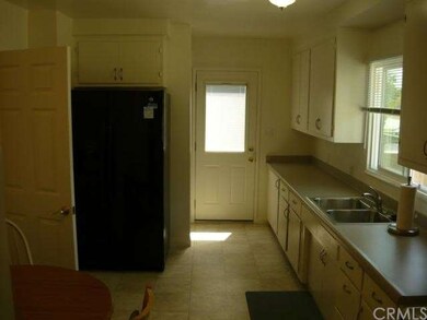 Newly upgraded kitchen!! New flooring, counter top, stainless steel sink! Shows great!!  