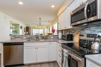 Kitchen featuring a sink, appliances with stainles