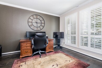 Study with double french doors and plantation shut