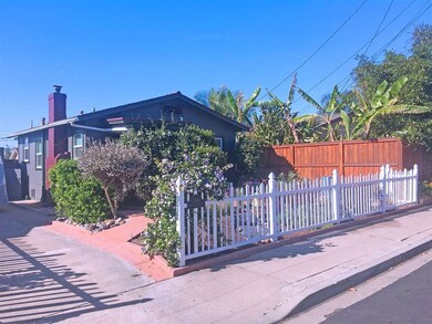 Private entry way with tandem parking and garage.