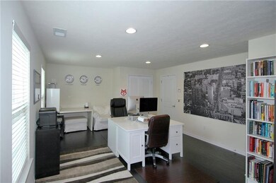 Another view of the office shows the large windows