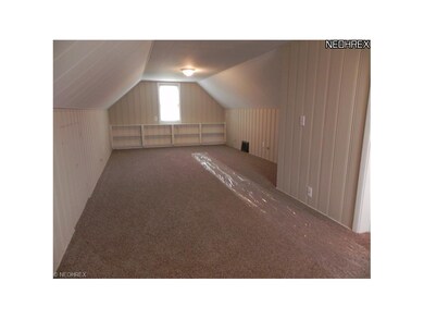 Upstairs bedrooom with new carpeting, freshly pain