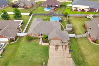 Aerial view of the home and back yard.