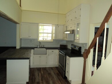 The kitchen features newer cabinets, flooring appliances and more!