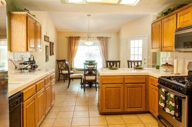 ANOTHER VIEW OF KITCHEN, NOTE LARGE DINING AREA OV