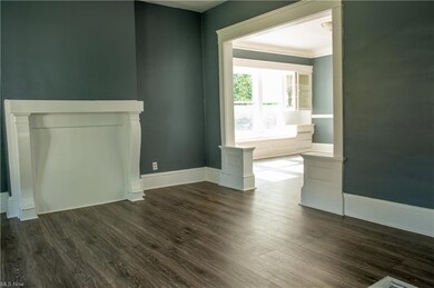 Unfurnished living room hardwood floors