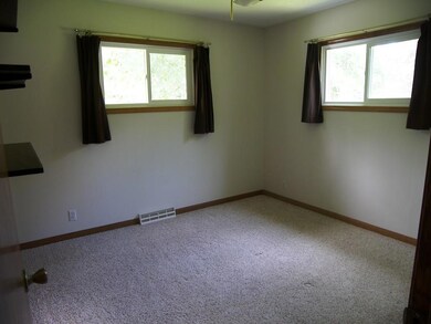 ONE OF THREE BEDROOMS ON THE MAIN FLOOR.