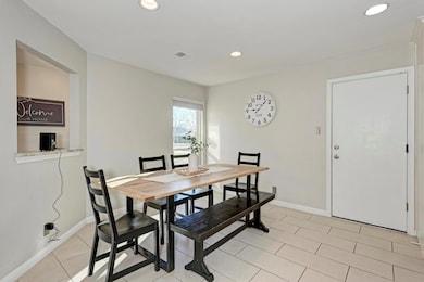 Dining area featuring recessed lighting, baseboar
